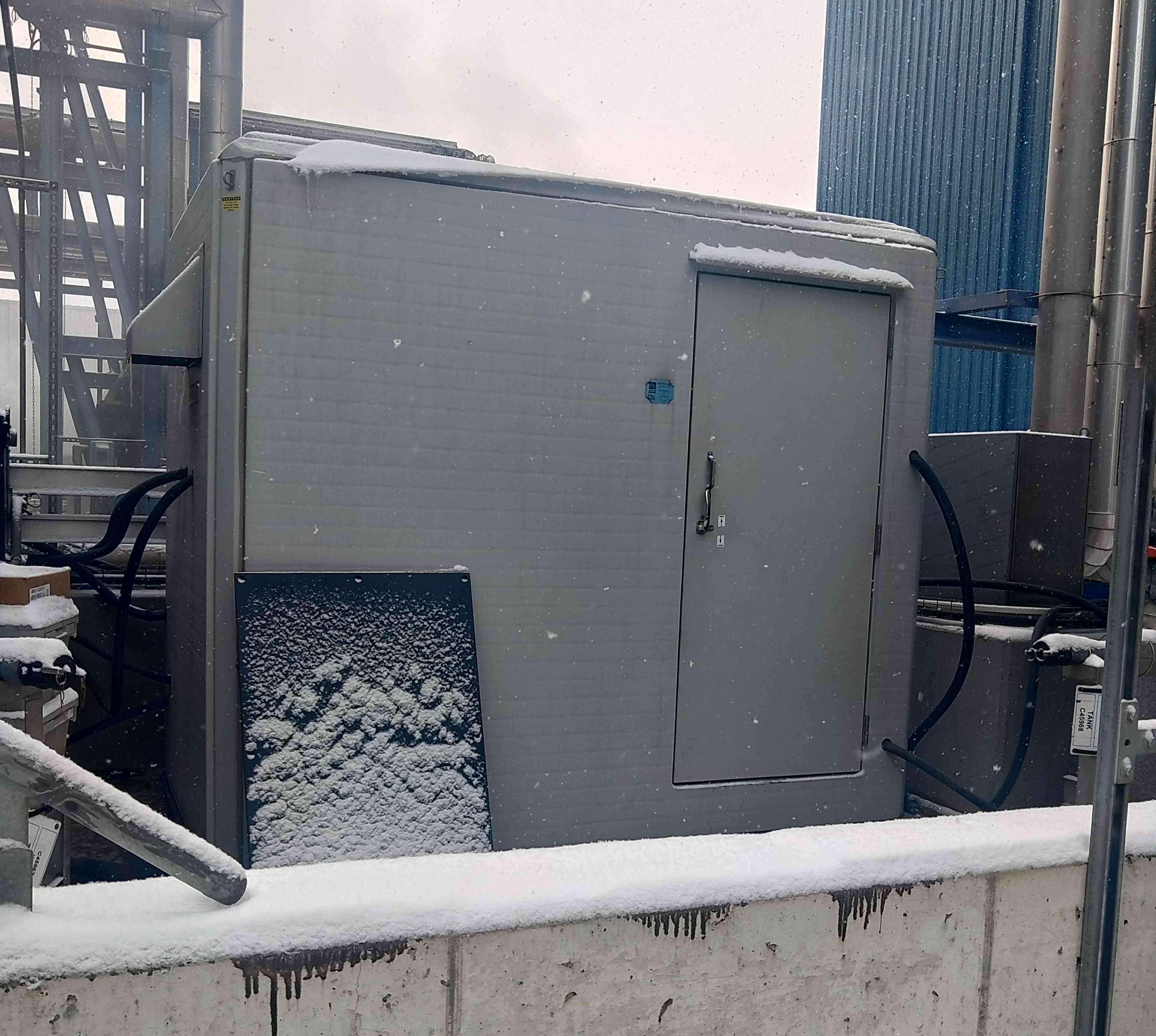 Fiberglass Chemical Hut on a Building