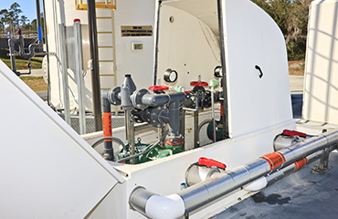 White clamshell shelter opens easily for maintenance
